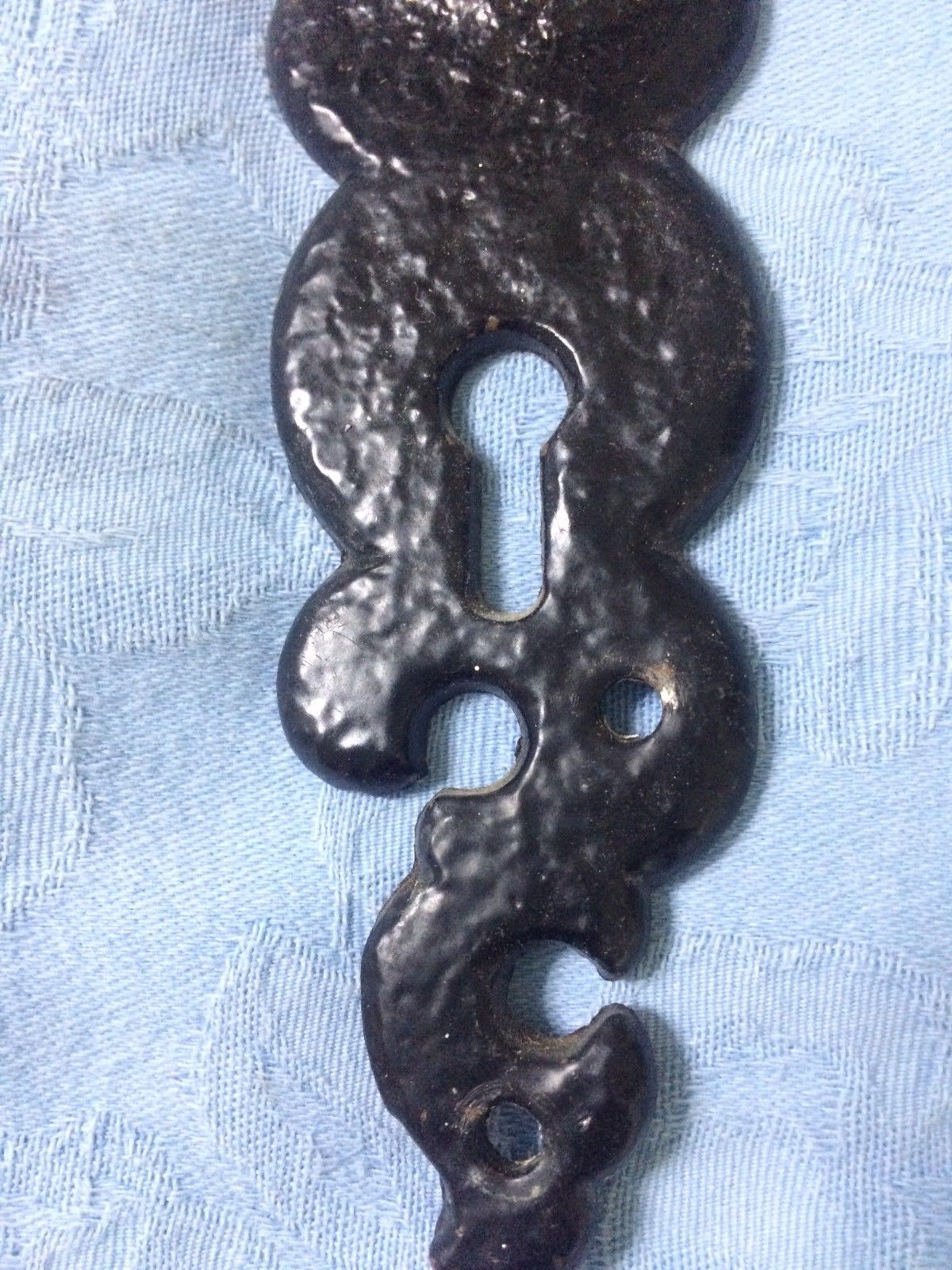 Two vintage cast Metal door handles and escutcheons