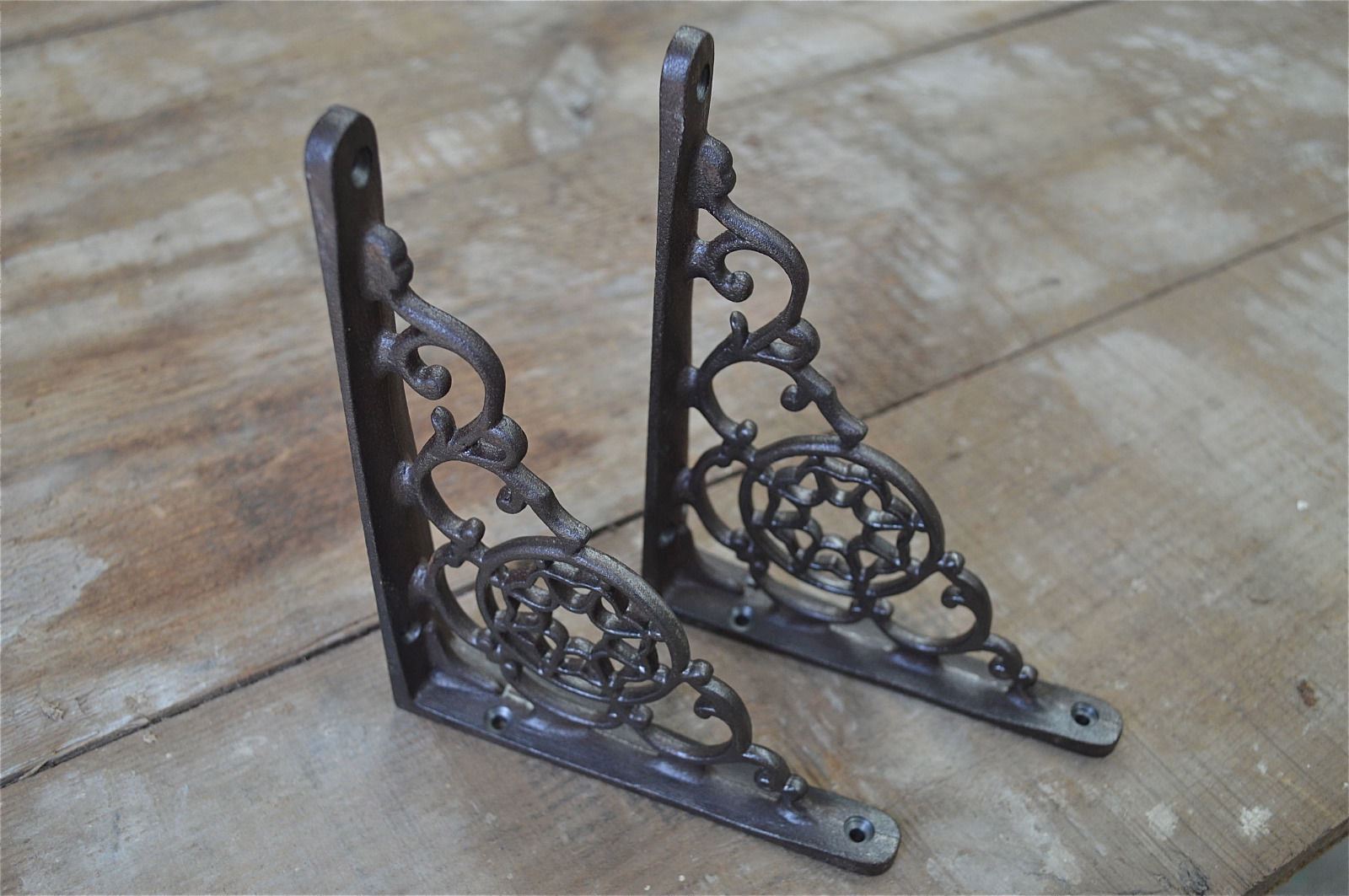 A pair of antique Victorian cobweb brackets cast iron wall shelf bracket AL24