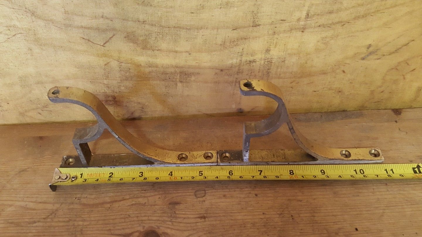 old vintage reclaimed brass curtain pole brackets