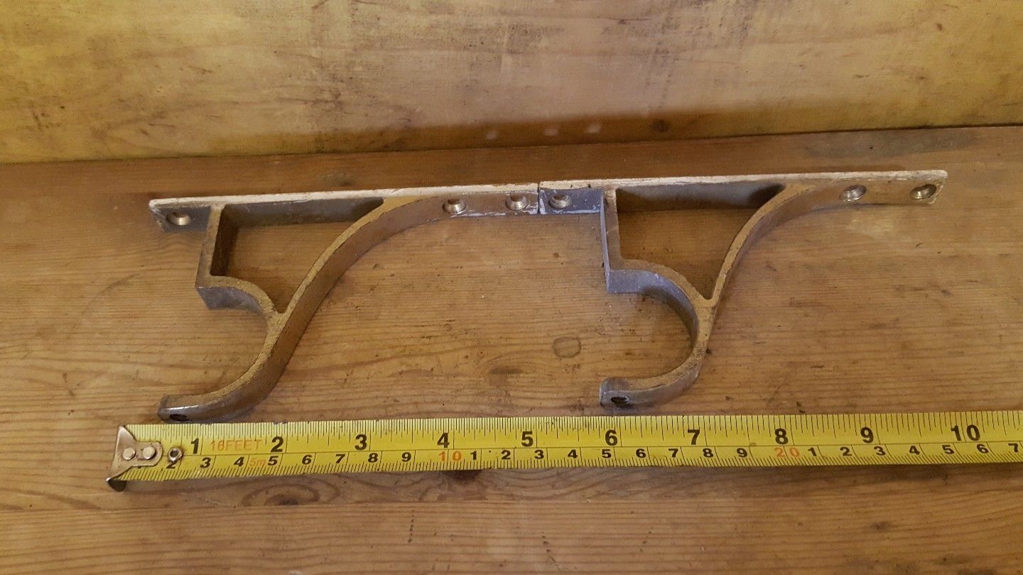 old vintage reclaimed brass curtain pole brackets