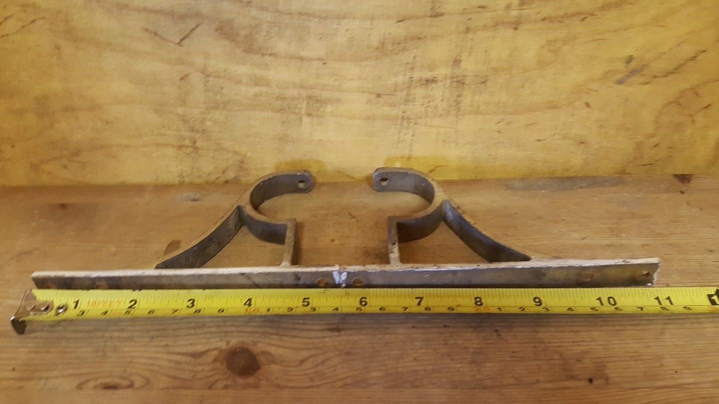 old vintage reclaimed brass curtain pole brackets