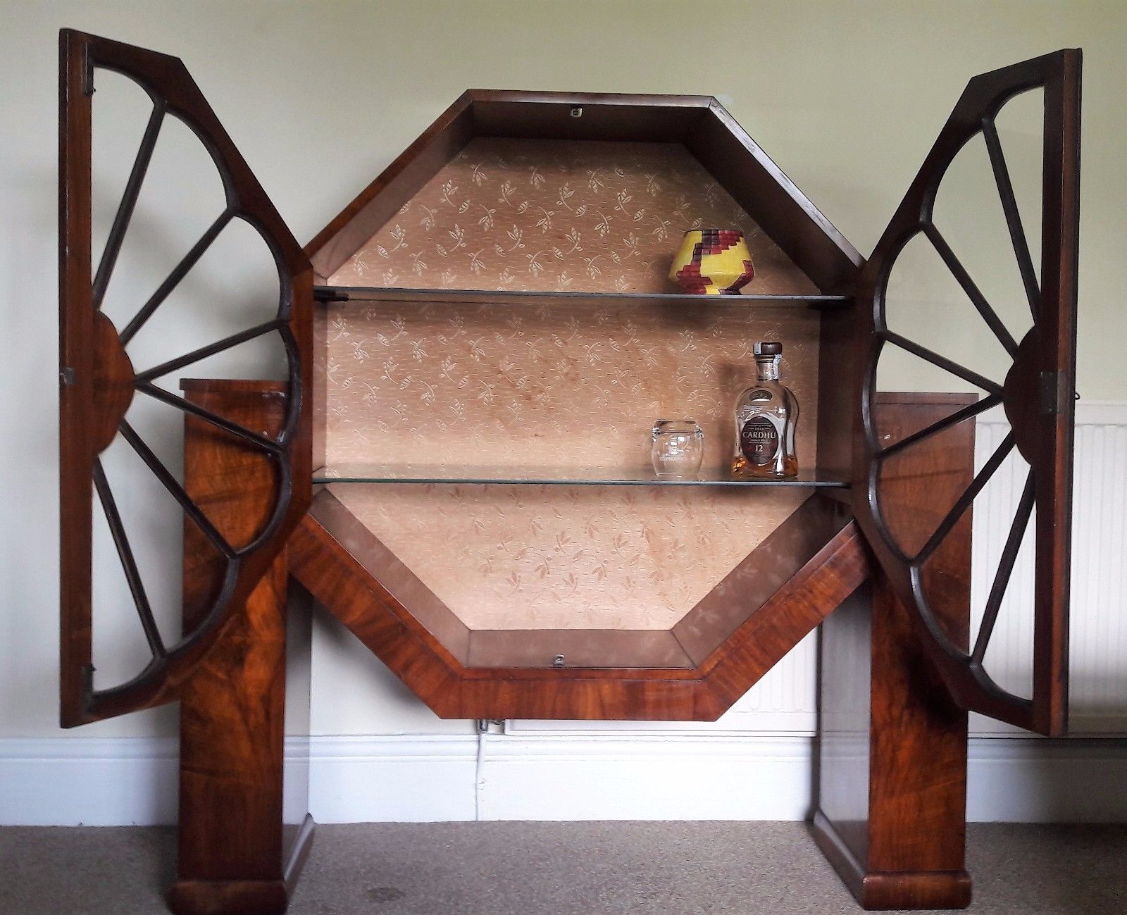 A  SUPERB 1930s / ART DECO OCTAGONAL WALNUT "SPIDER" CABINET.