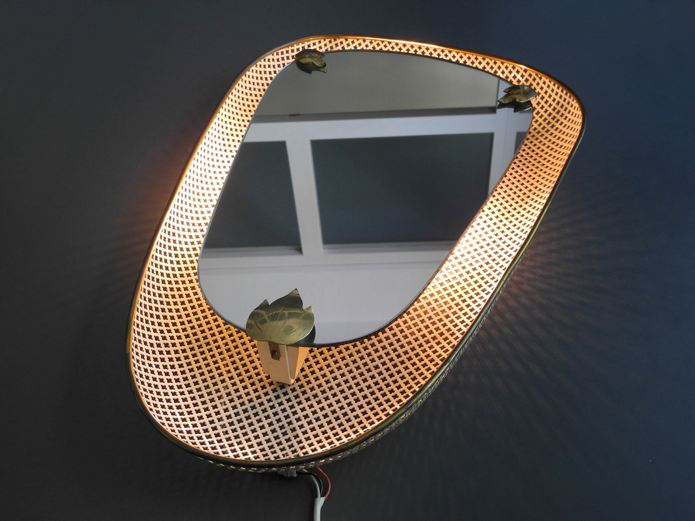 Mid Century metal illuminated mirror & one shelf | Vereinigte Werkstätten