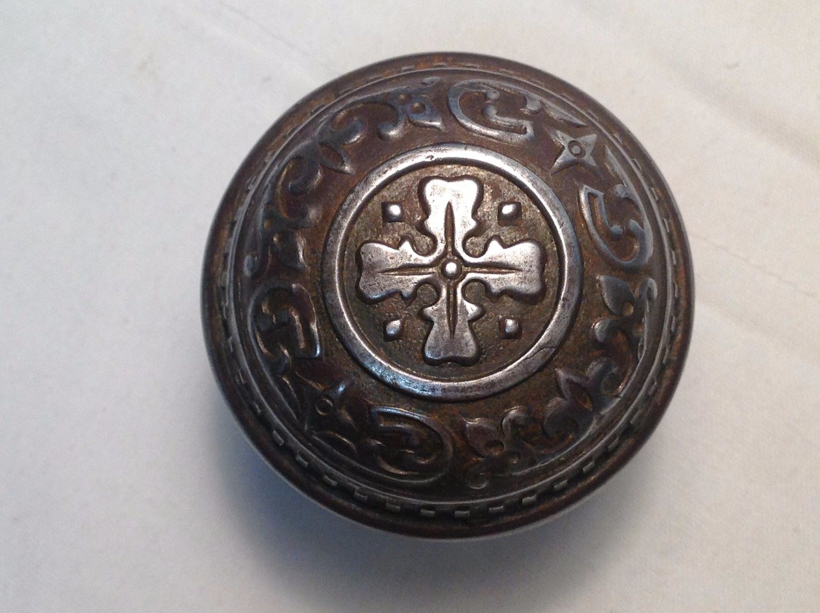 SET OF ANTIQUE ORNATE STEEL OR TIN DOOR KNOBS-WITH SPINDLE