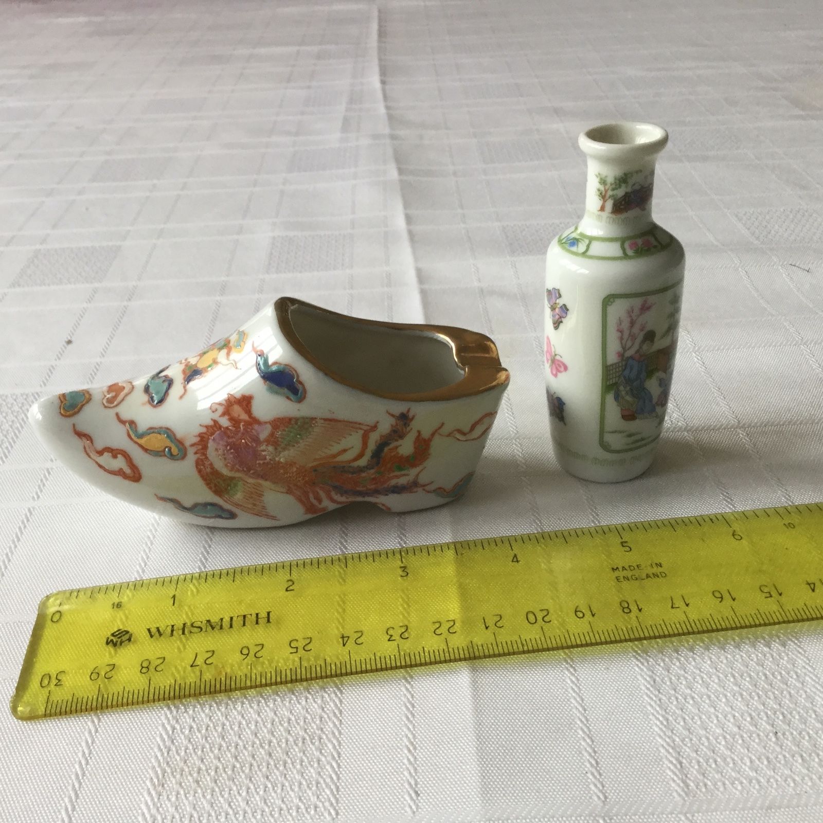 HAND PAINTED CHINESE PORCELAIN SHOE with characters plus bottle.