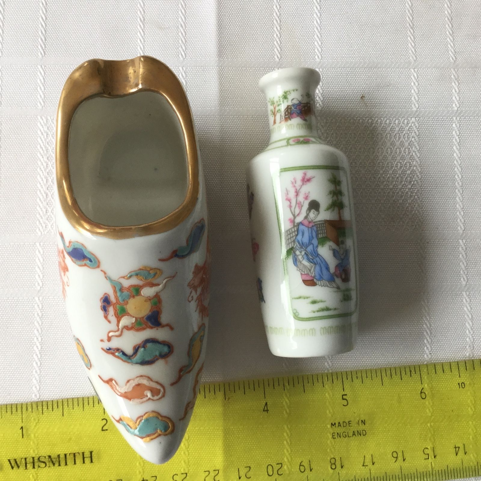 HAND PAINTED CHINESE PORCELAIN SHOE with characters plus bottle.