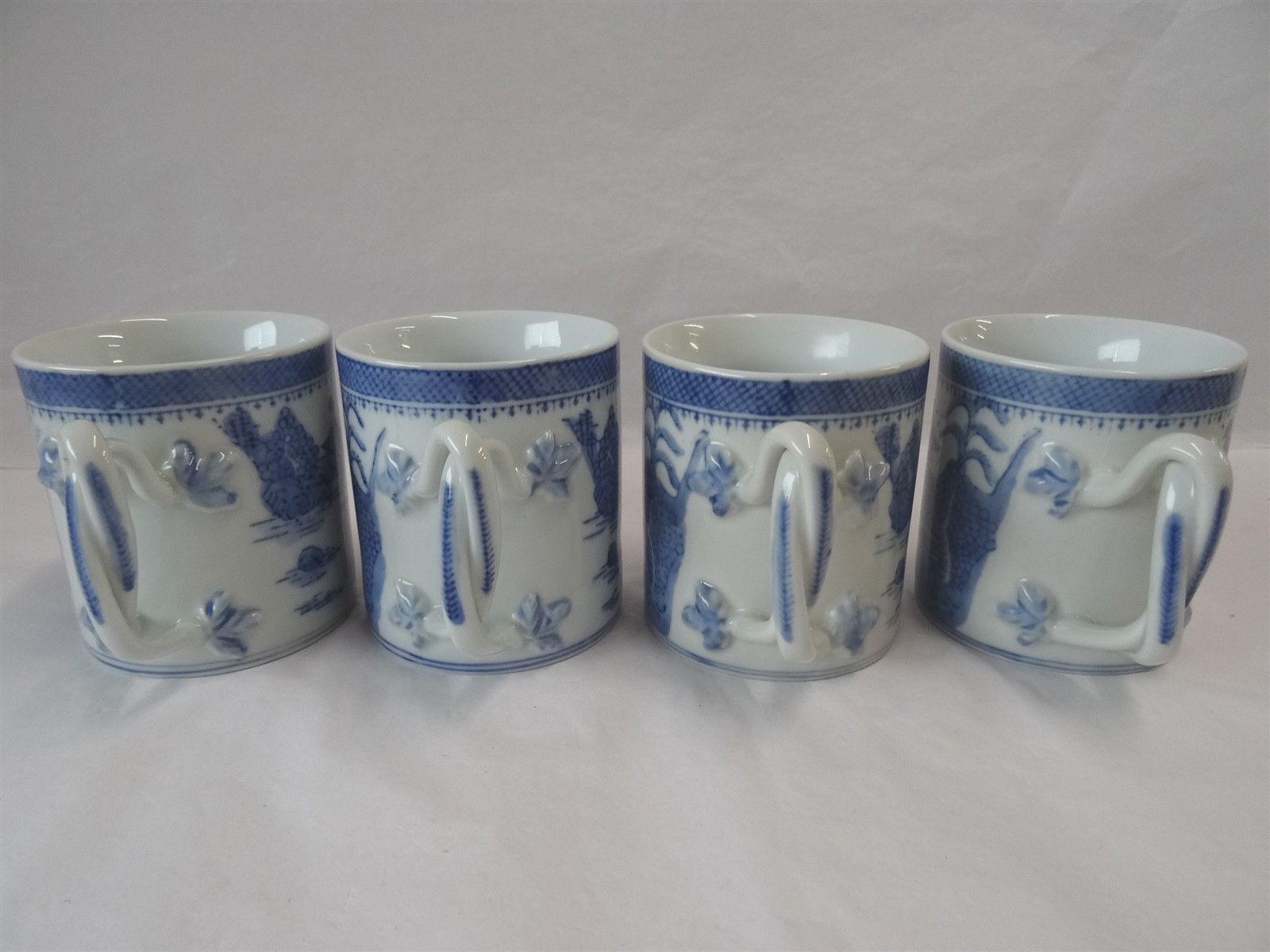 CHINESE BLUE & WHITE CHINA HANDLED MUGS - SET OF 4