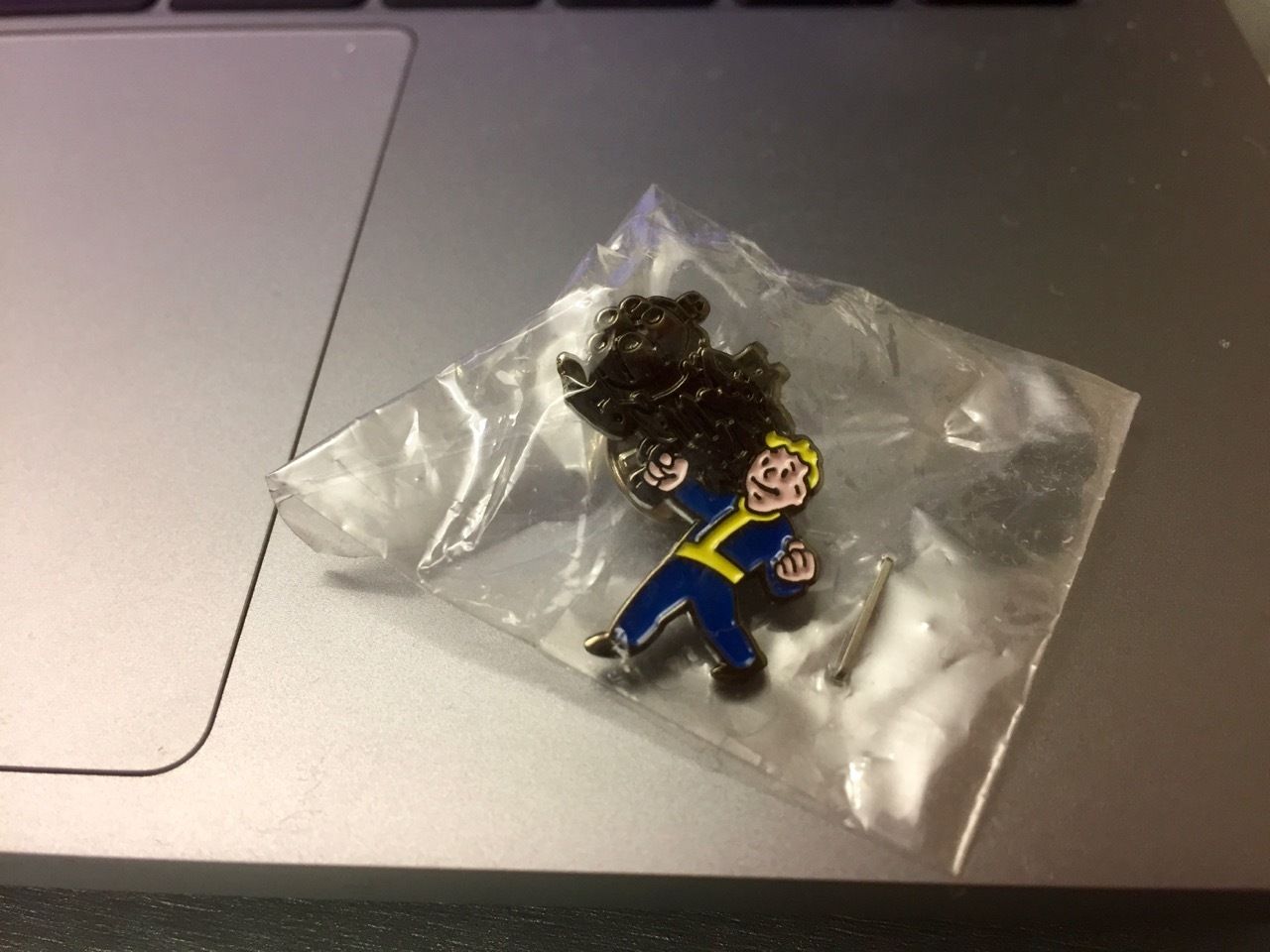 Fallout 3 promotional lapel pin vault boy with a gun