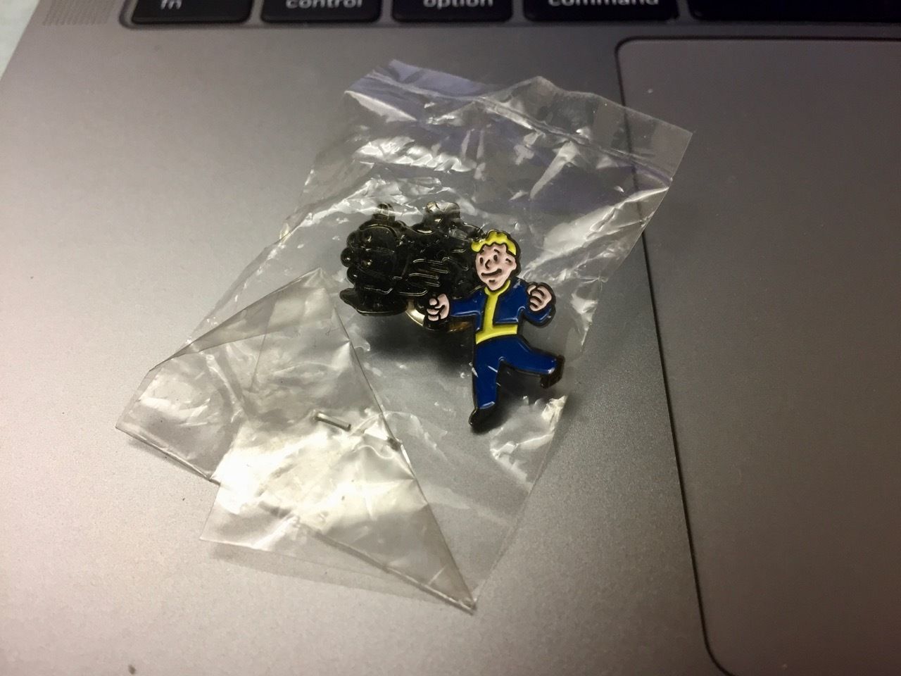 Fallout 3 promotional lapel pin vault boy with a gun