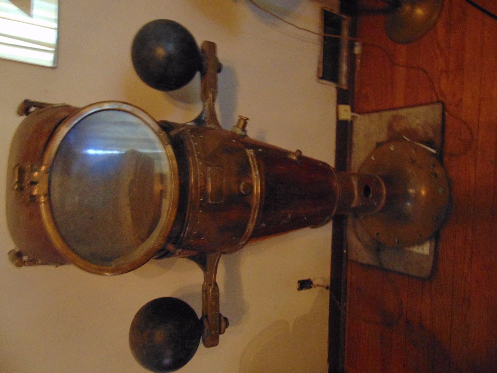 binnacle compass, made of brass has hood to cover compass.