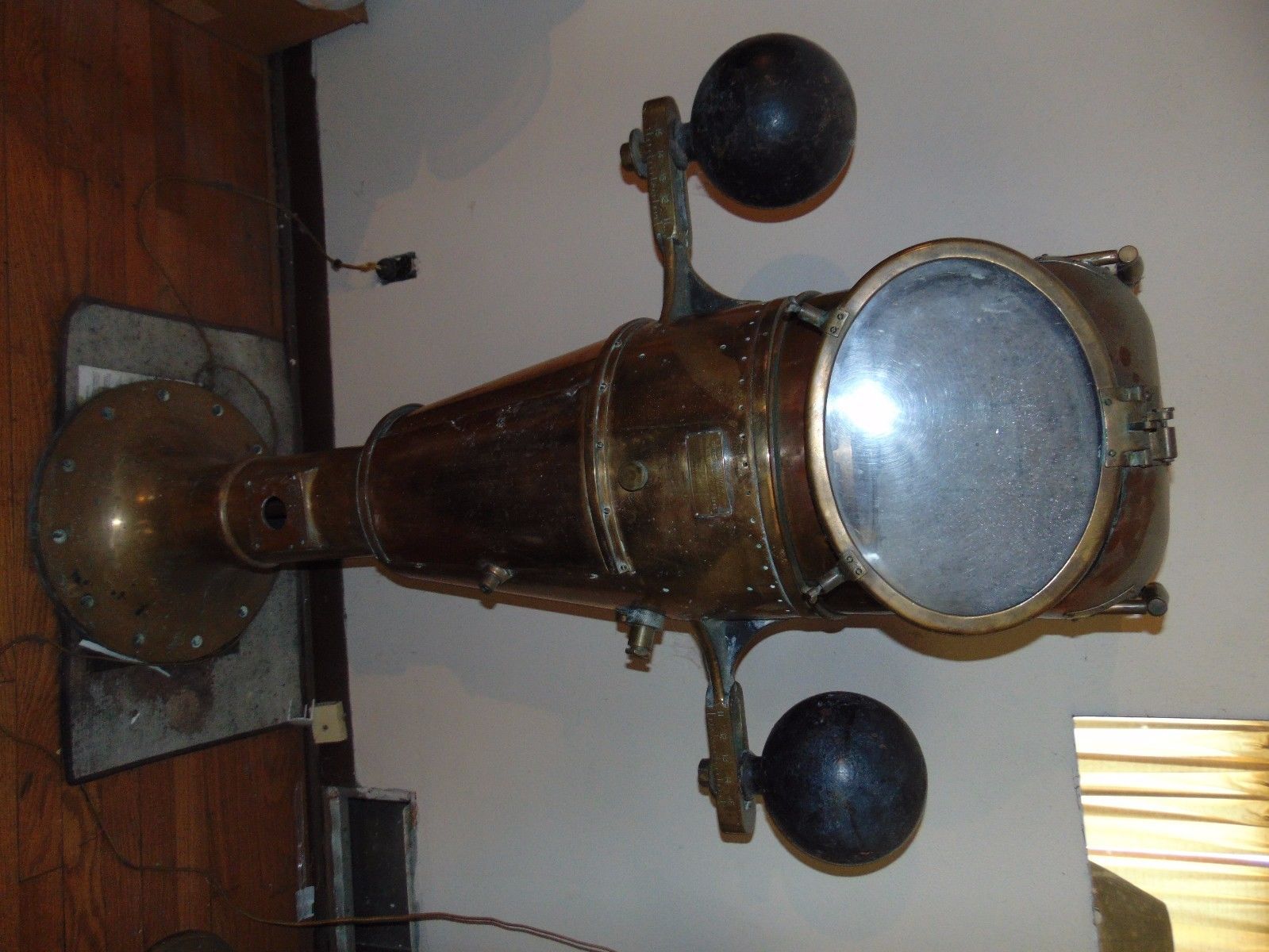 binnacle compass, made of brass has hood to cover compass.