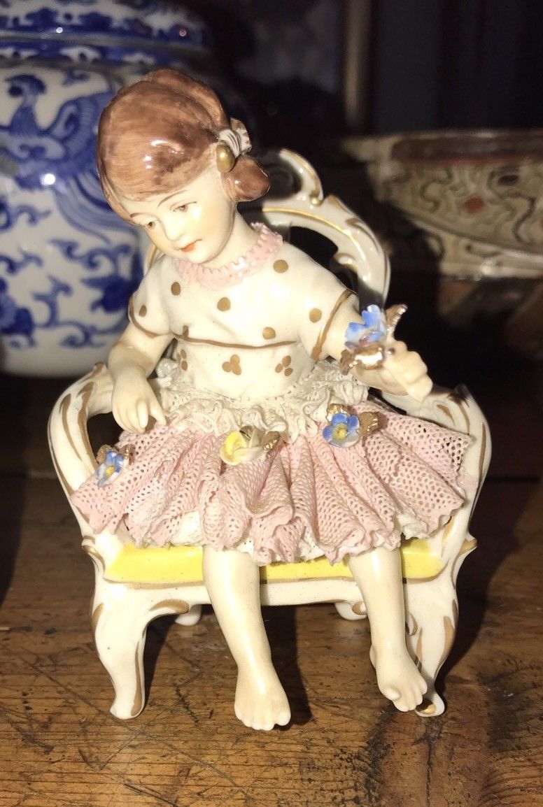 Vintage Porcelain Figurine Child In Chair  Hallmark Crown