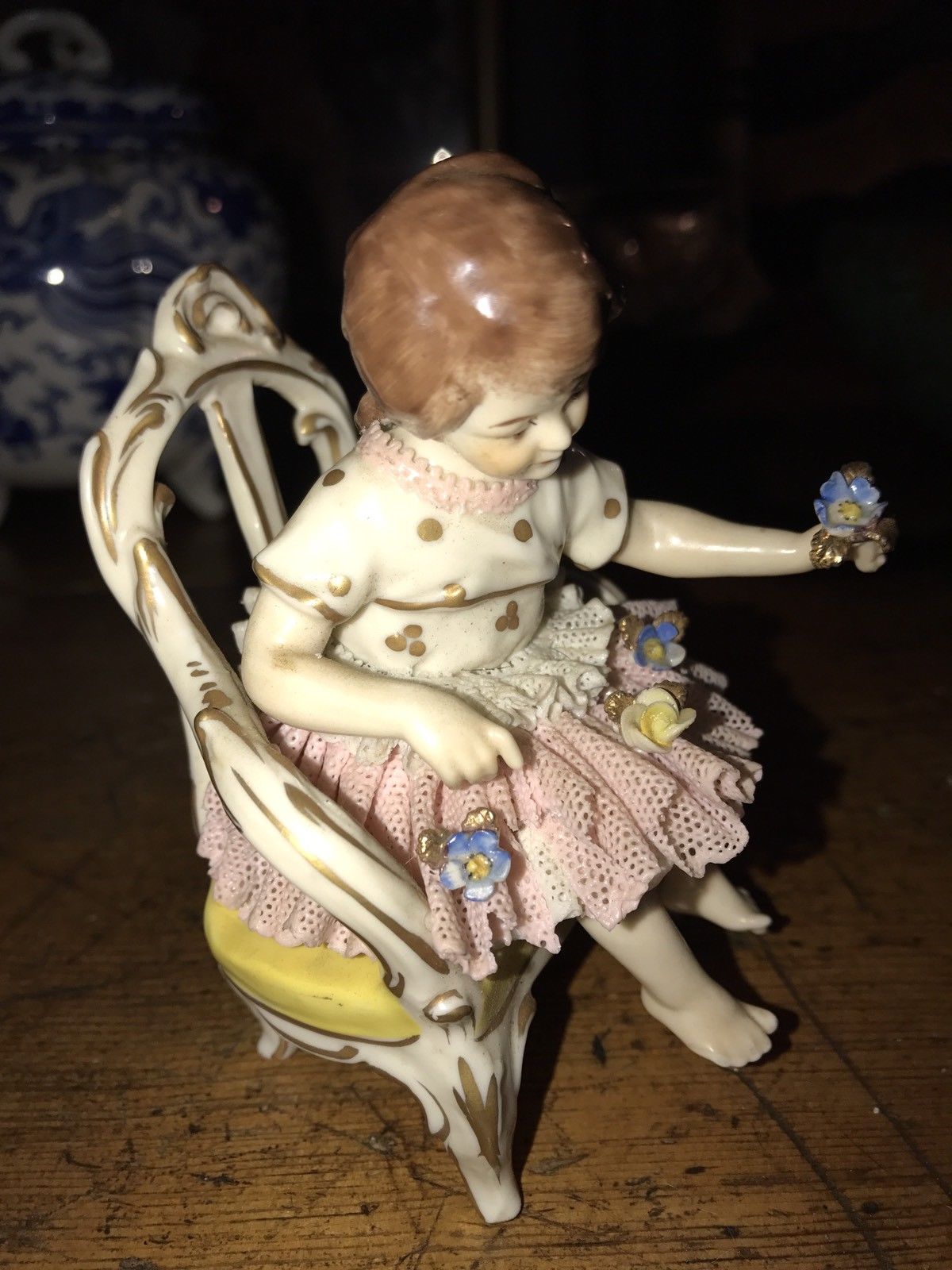 Vintage Porcelain Figurine Child In Chair  Hallmark Crown