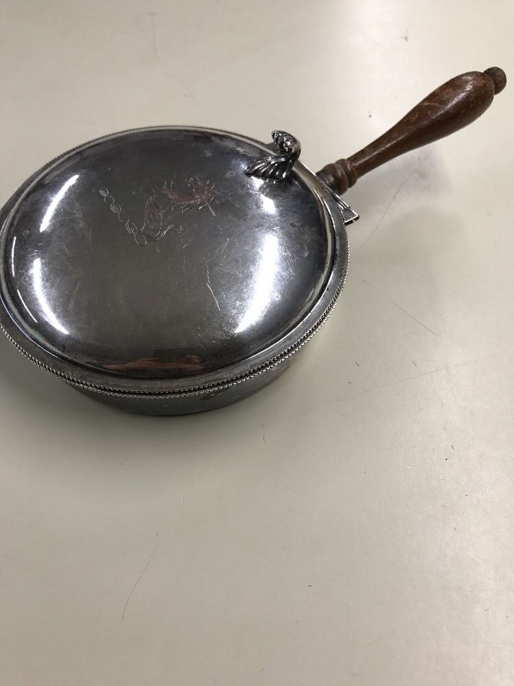 SILVER BED WARMER, WOODEN HANDLE , MEASURES 6.5" AT DIAMETER