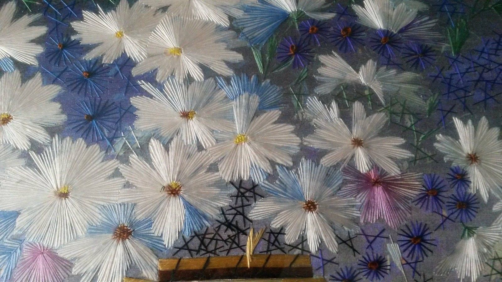 A Beautifully Embroidered Picture of Flowers.