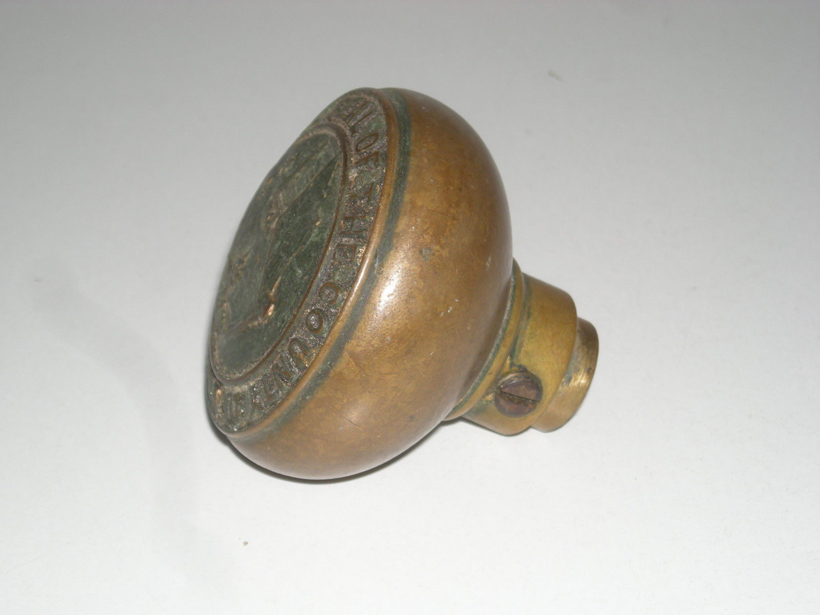 ANTIQUE BRASS DOOR KNOB. SEAL OF THE COUNTY OF UNION NJ