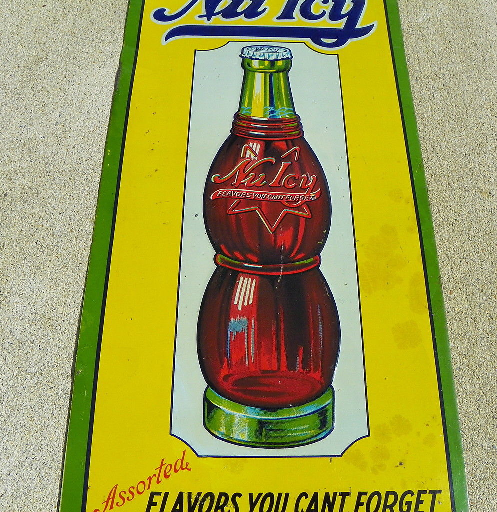 NU ICY BEVERAGE 1920'S SODA  TIN SIGN WITH EMBOSSED BOTTLE