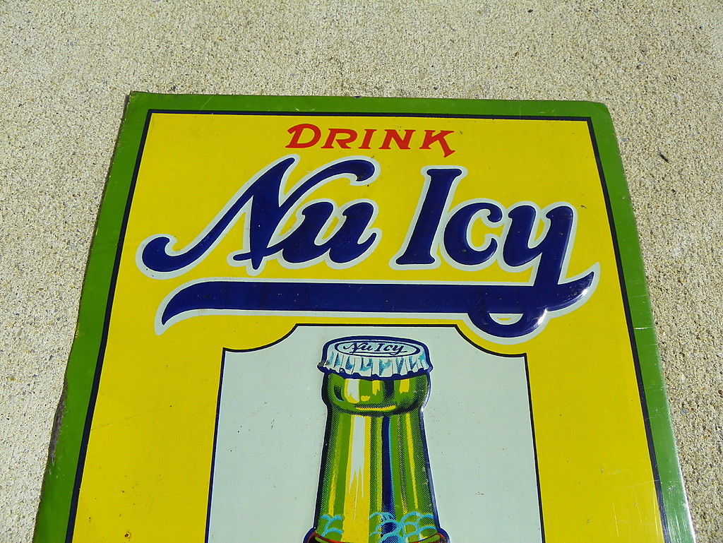 NU ICY BEVERAGE 1920'S SODA  TIN SIGN WITH EMBOSSED BOTTLE