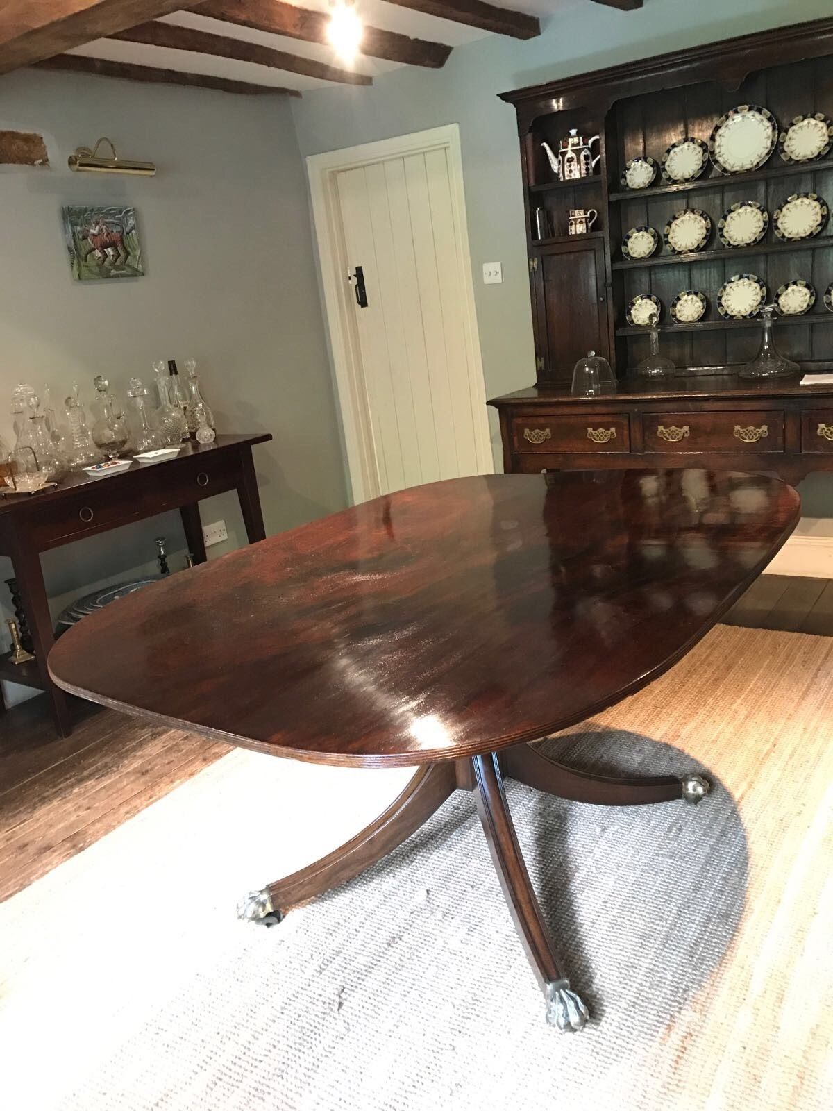 Antique Regency mahogany tilt-top dining table