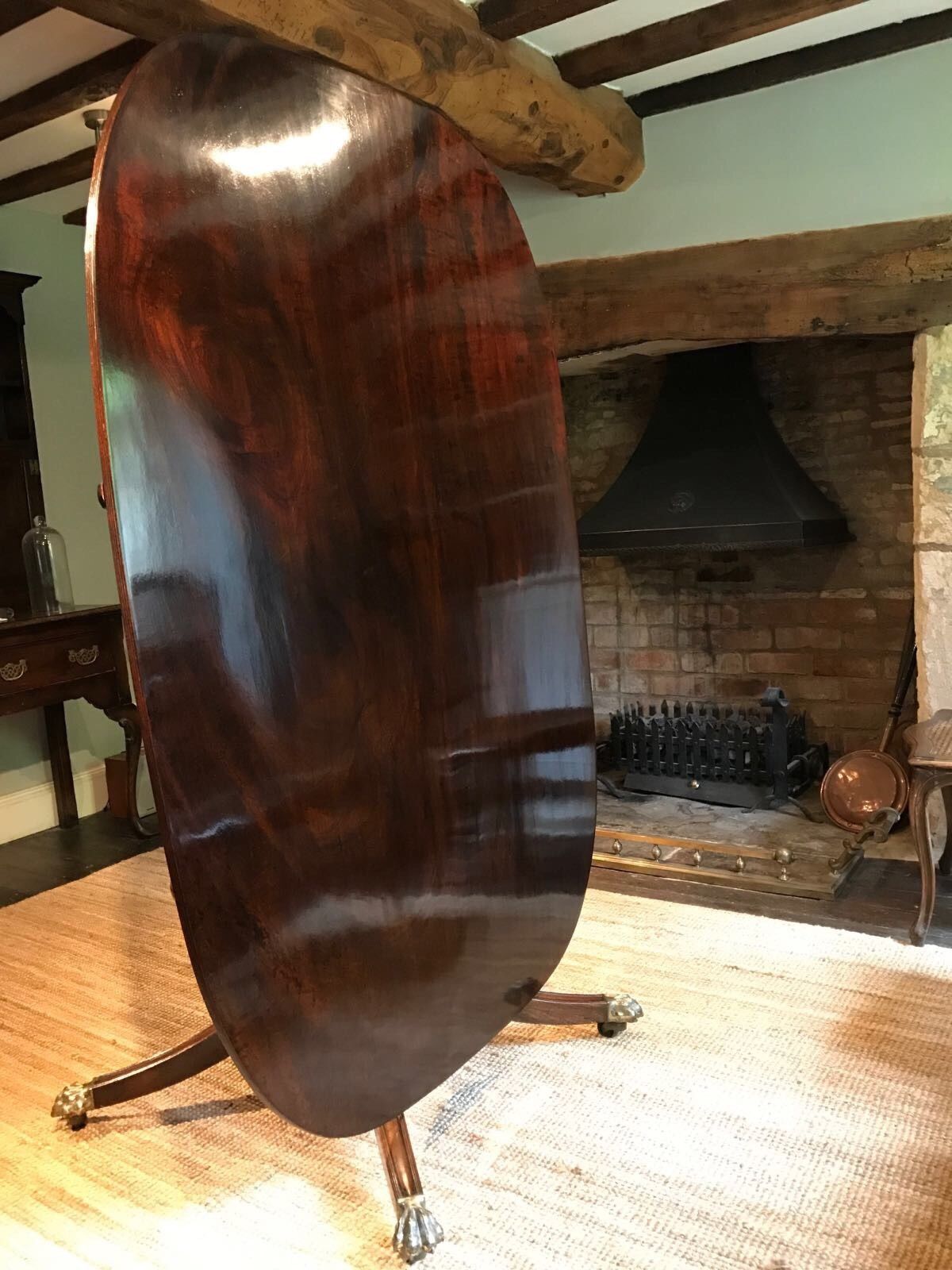 Antique Regency mahogany tilt-top dining table