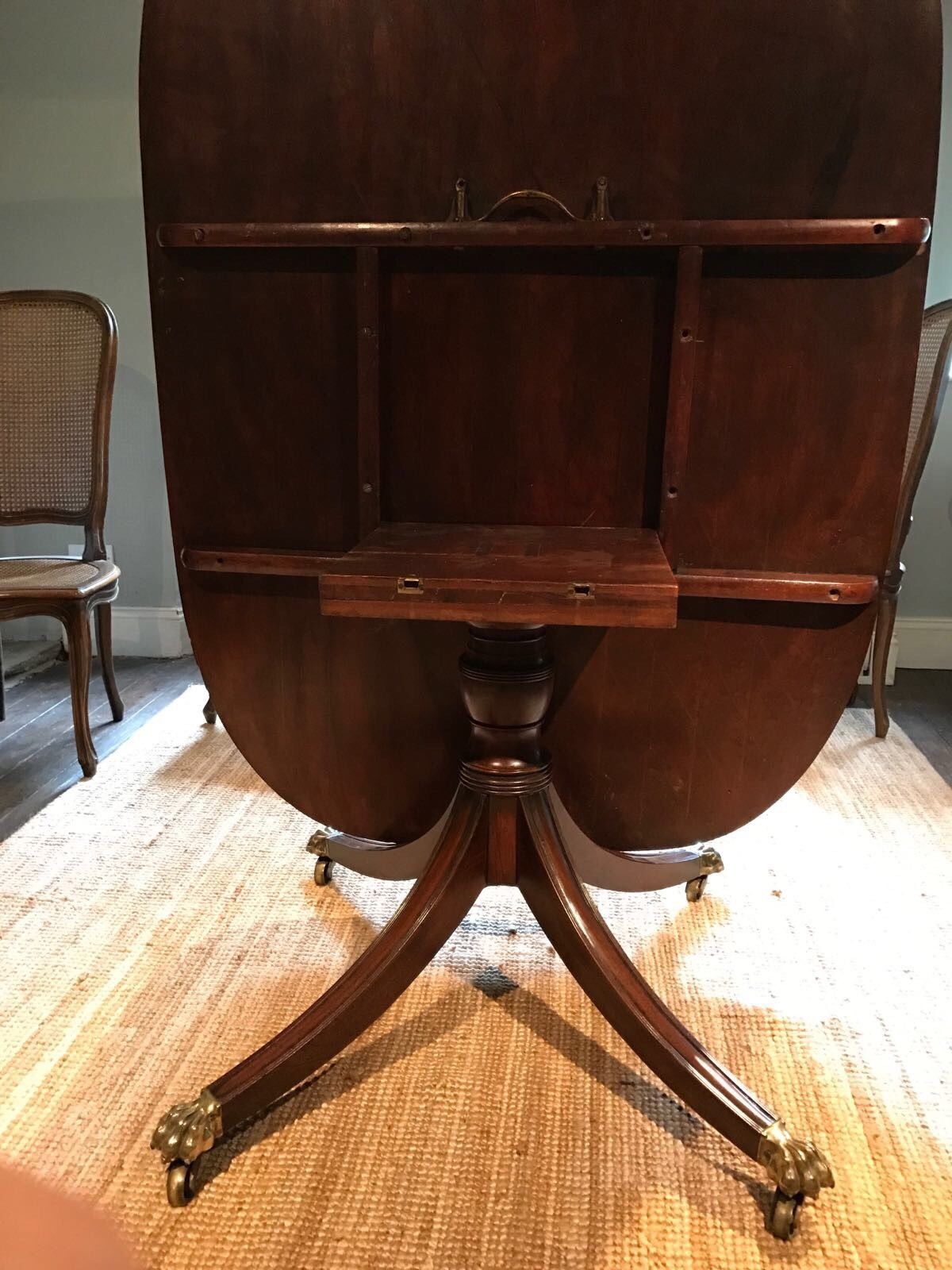 Antique Regency mahogany tilt-top dining table