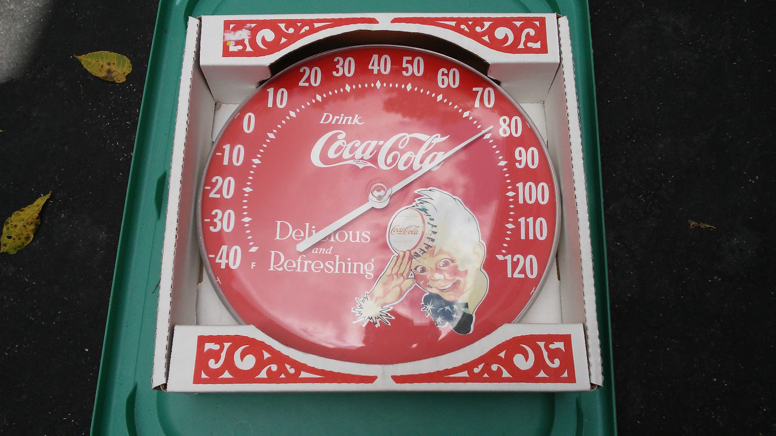 1980s red sprite boy coca cola round advertising thermometer in box.