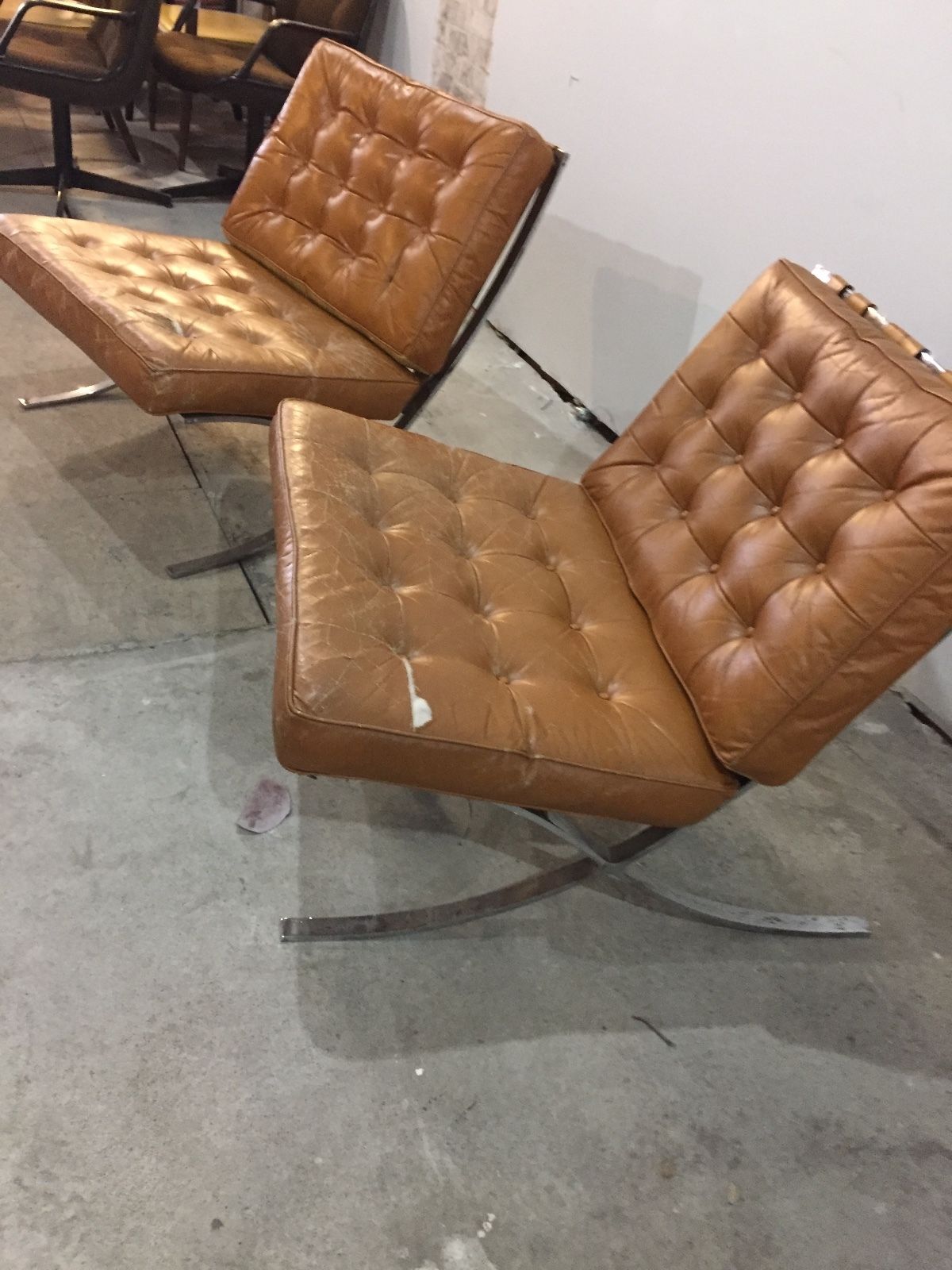 Pair of tan vintage barcelona chairs industria argentina