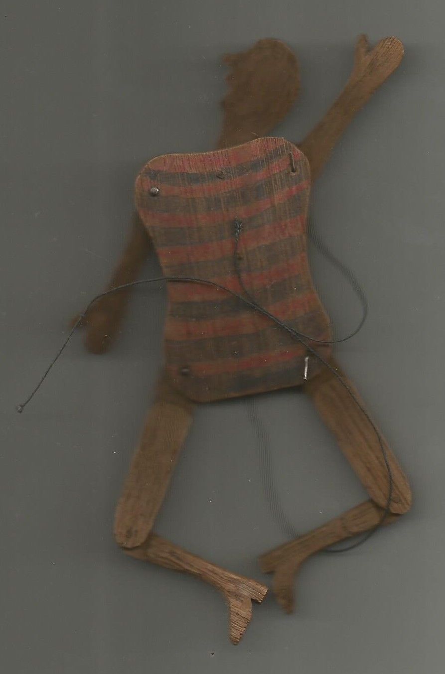 early handmade wooden folk art man jointed in paint primitive