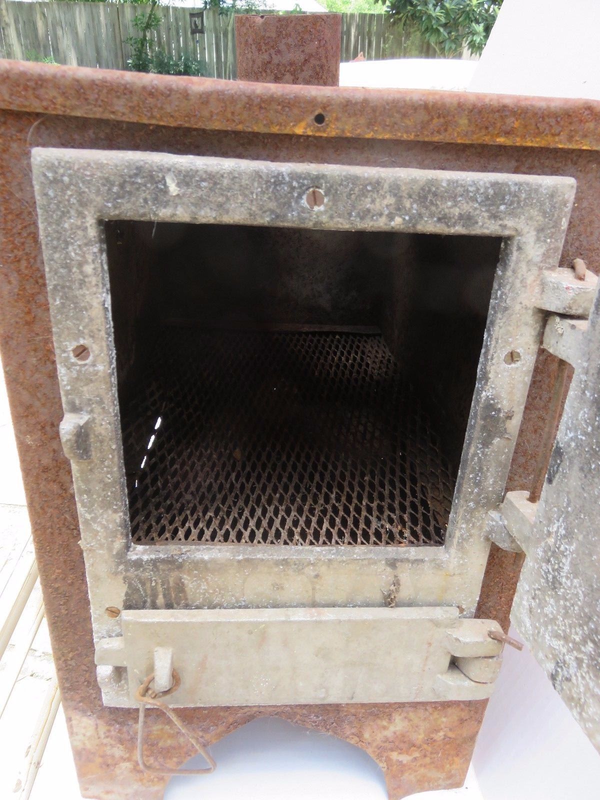 Antique parlor coal wood stove small metal warmer heater