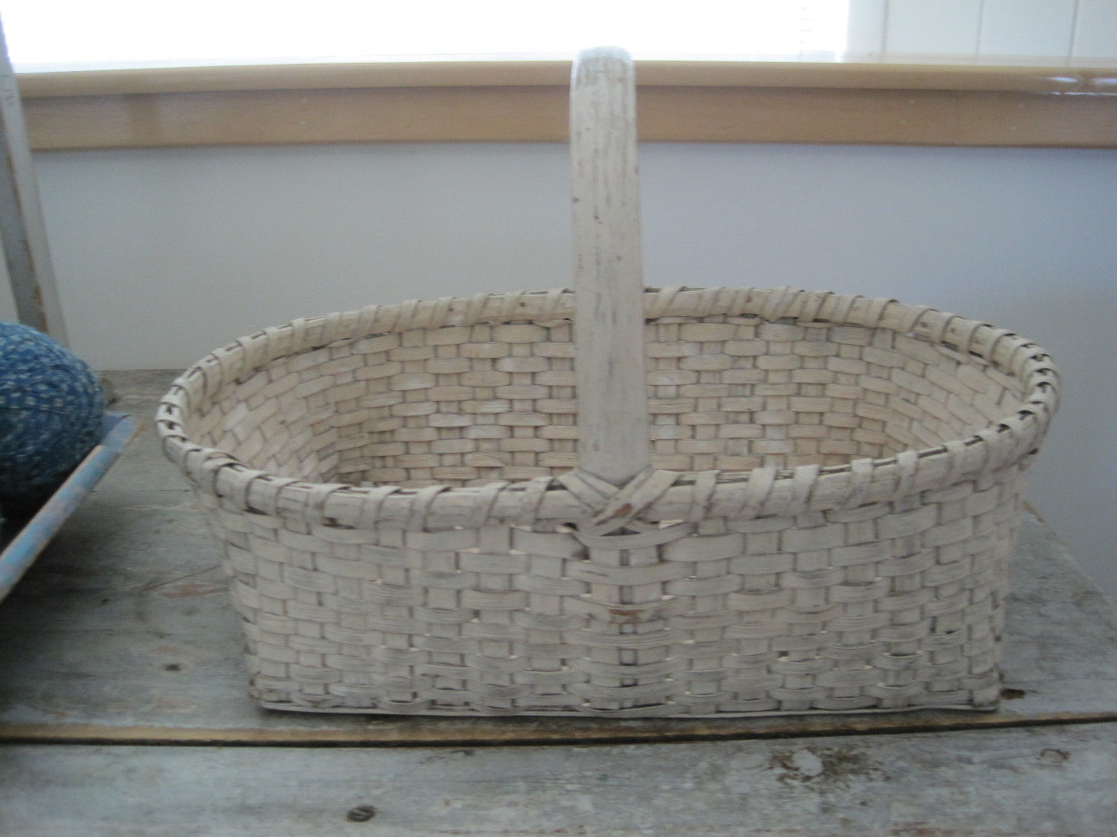 19th Century Old Cream Paint Heavy Basket with Three Wood Runners on the Bottom