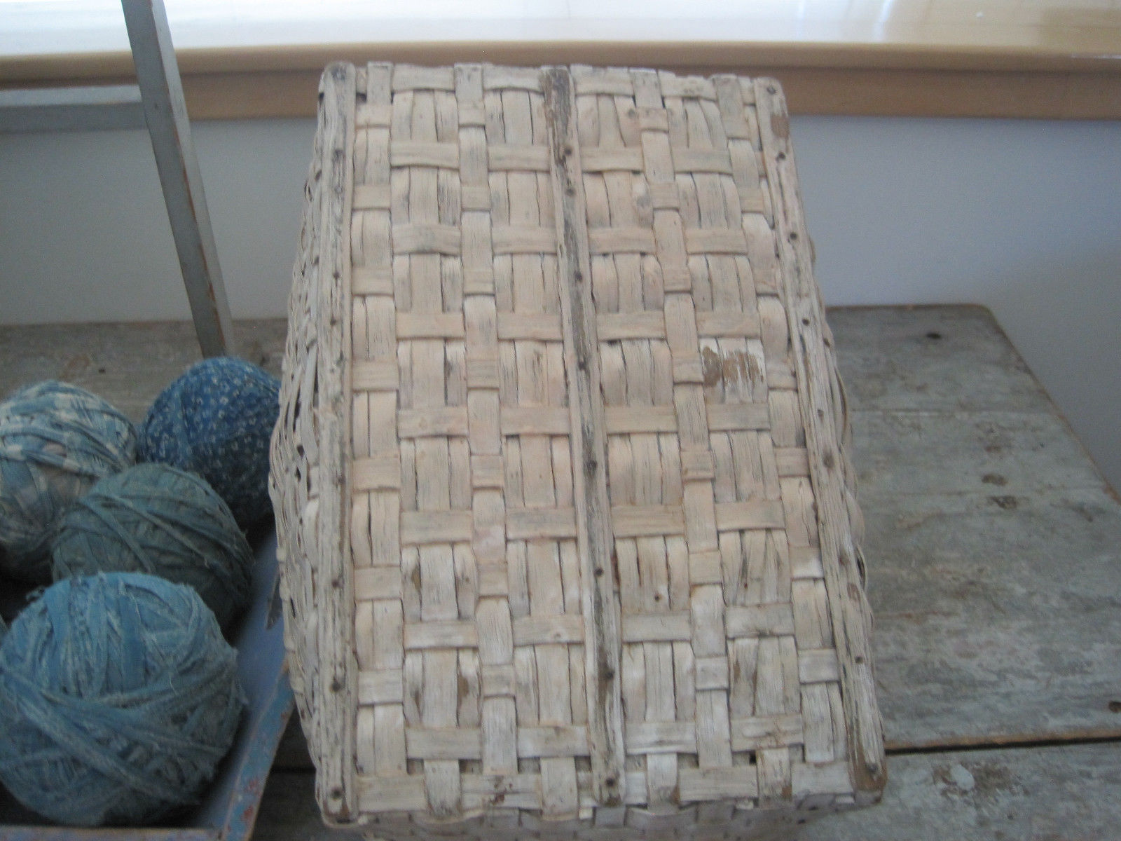 19th Century Old Cream Paint Heavy Basket with Three Wood Runners on the Bottom