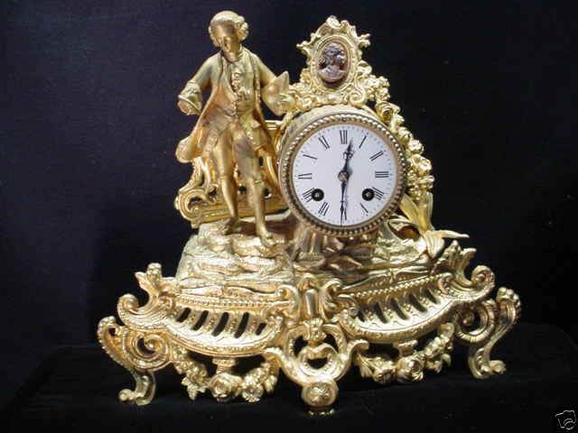 French Gilt Figural Clock with Glass Dome