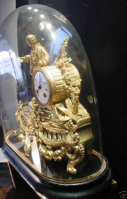 French Gilt Figural Clock with Glass Dome