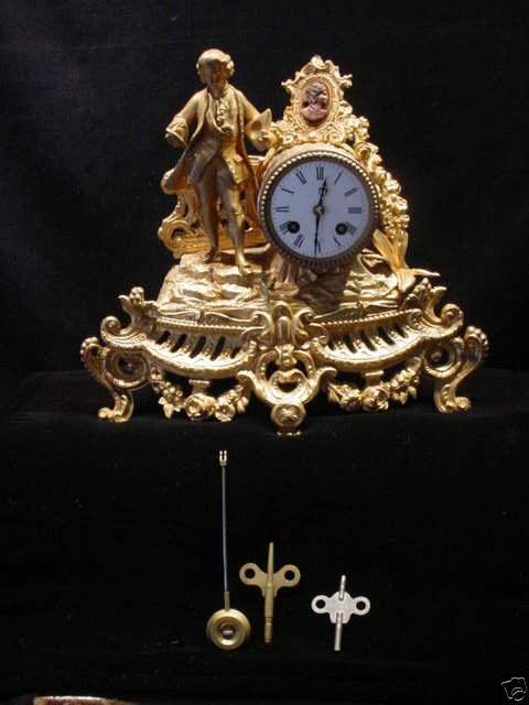 French Gilt Figural Clock with Glass Dome