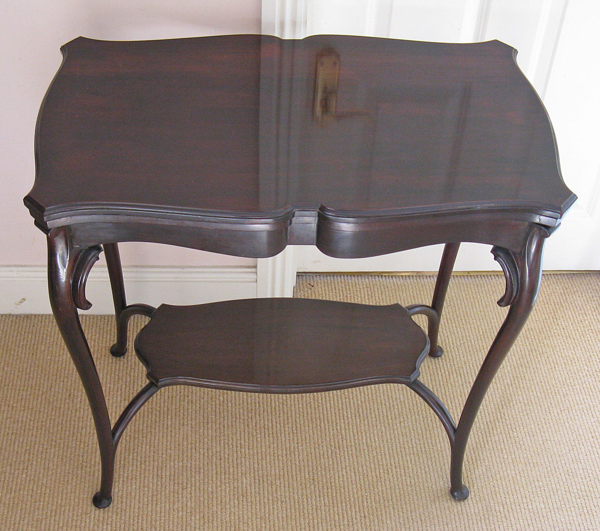 Early 20th Century Stained Mahogany Fold-Over Serpentine Top Card or Side Table