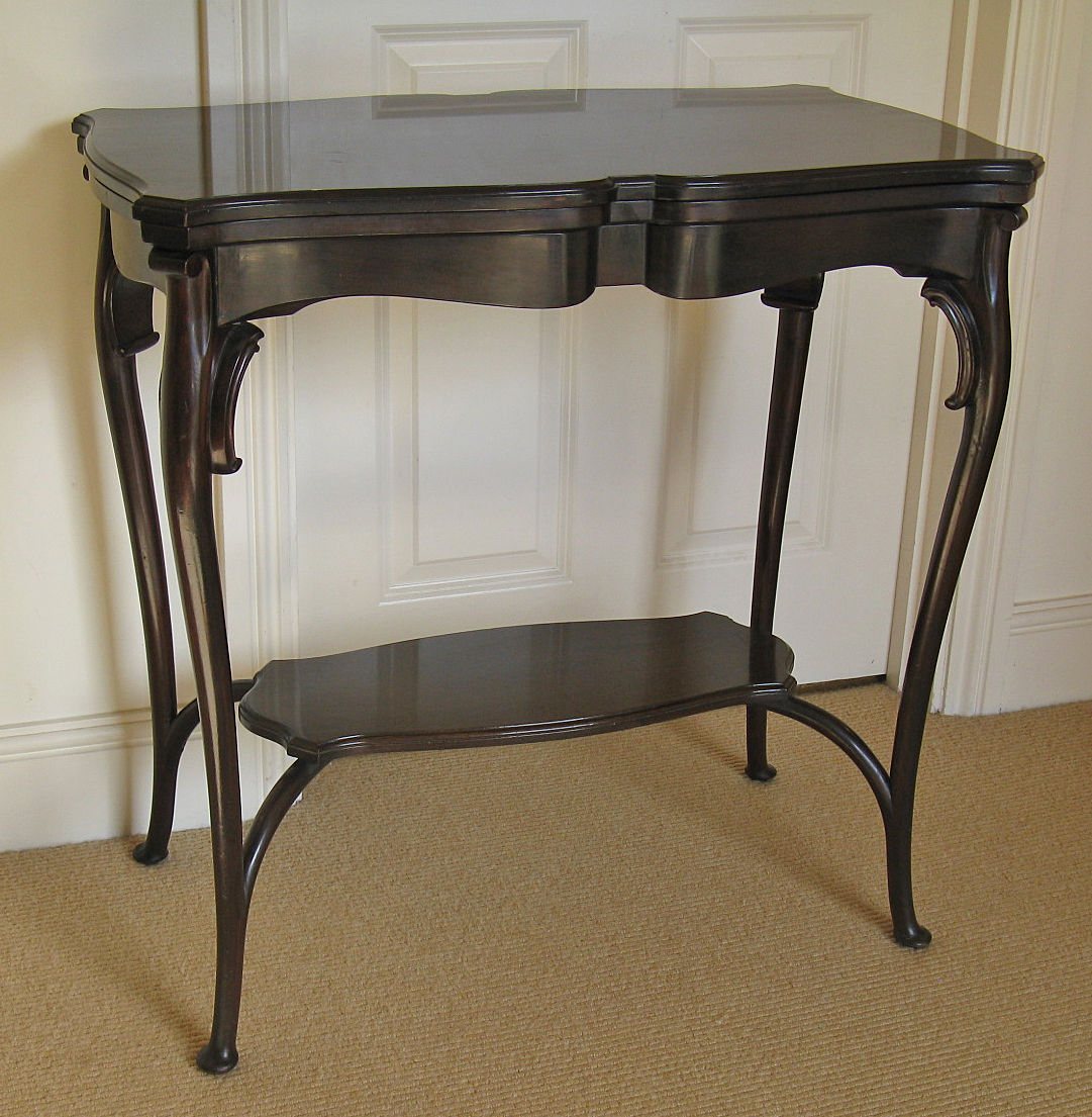 Early 20th Century Stained Mahogany Fold-Over Serpentine Top Card or Side Table