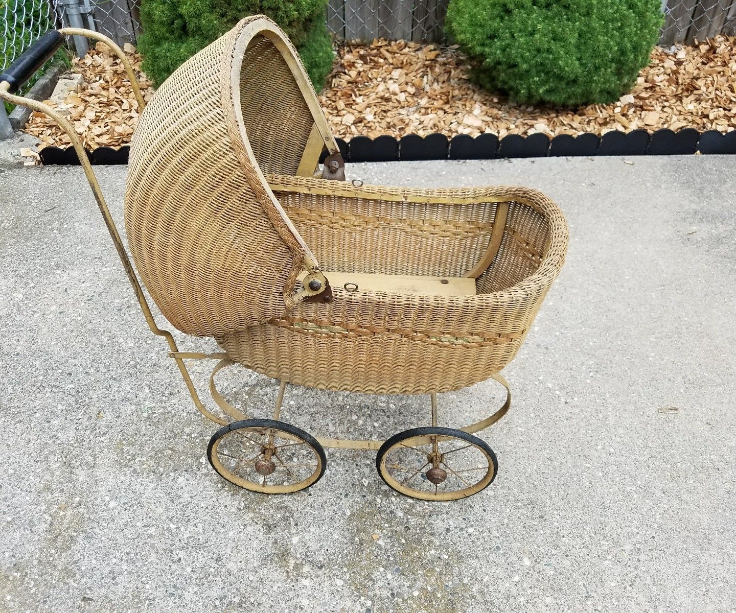 Antique wicker baby carriage/ stroller