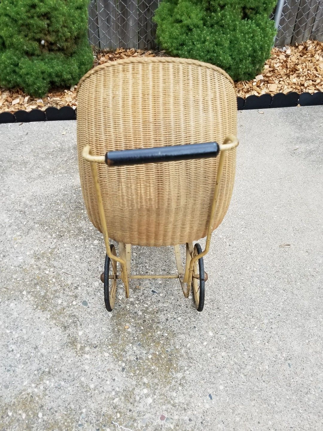 Antique wicker baby carriage/ stroller