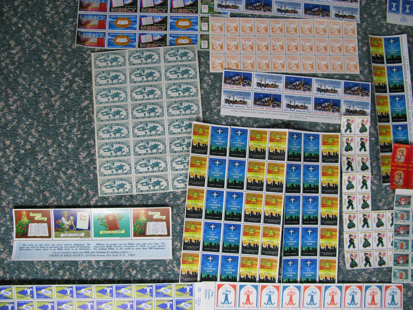 USA cinderella stamps mixed lot sheets & part sheets Christmas Boys town etc 710