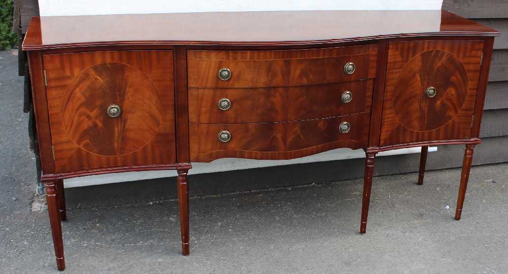 1960's Mahogany Serpentine Sideboard with cupboards and Drawers.