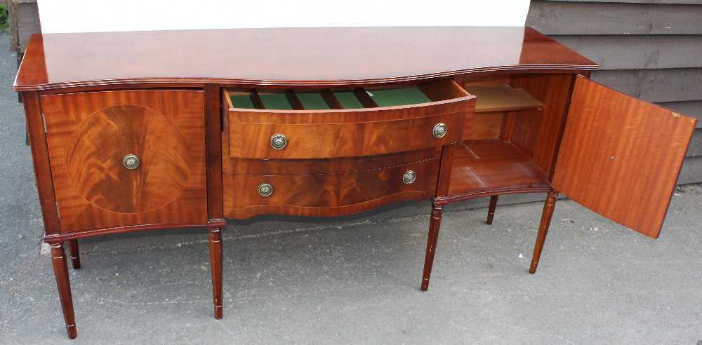 1960's Mahogany Serpentine Sideboard with cupboards and Drawers.