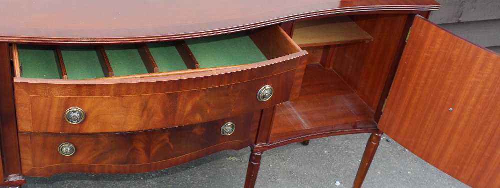 1960's Mahogany Serpentine Sideboard with cupboards and Drawers.