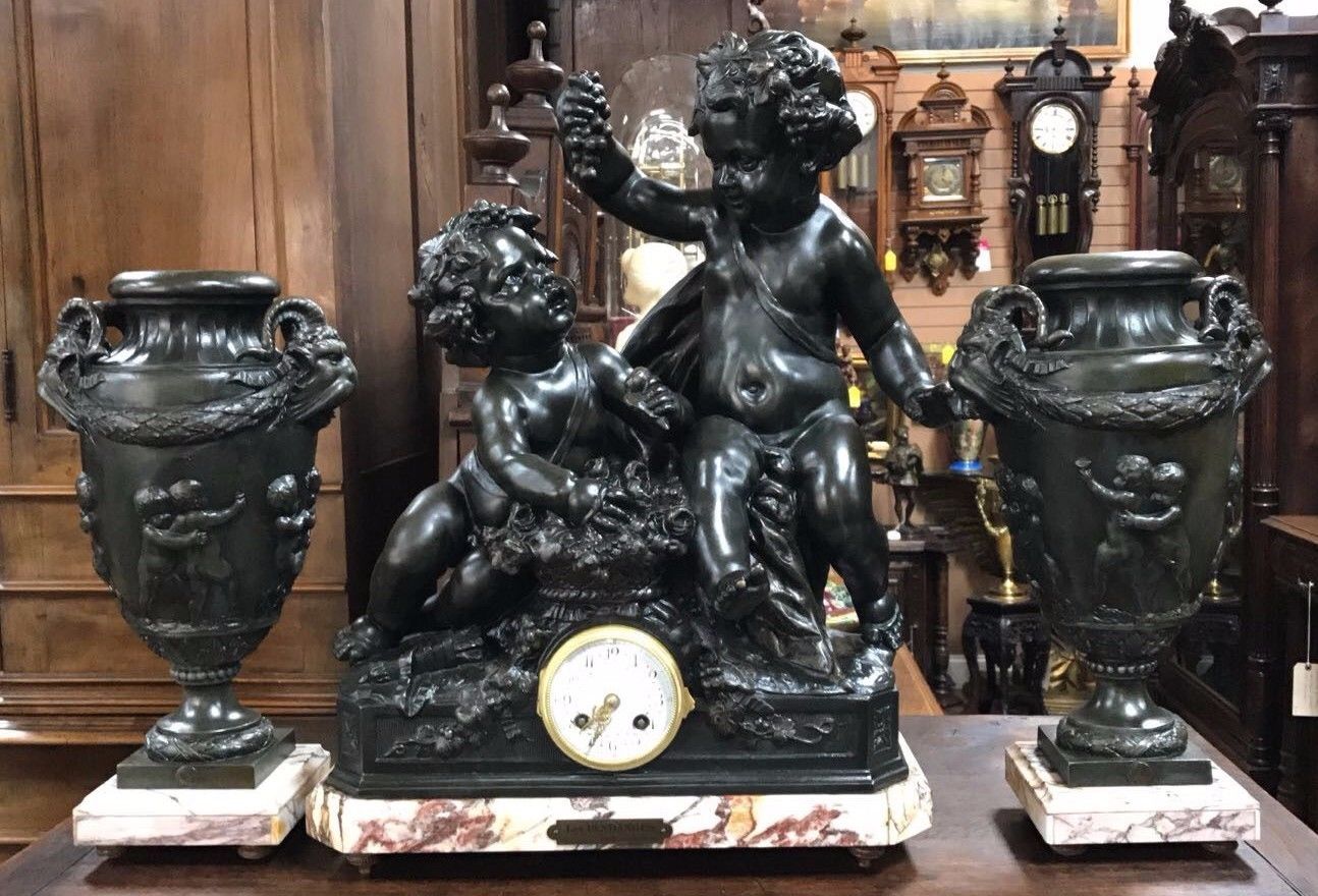 ANTIQUE FRENCH FIGURAL MANTEL CLOCK SET WITH VASES  France 1890