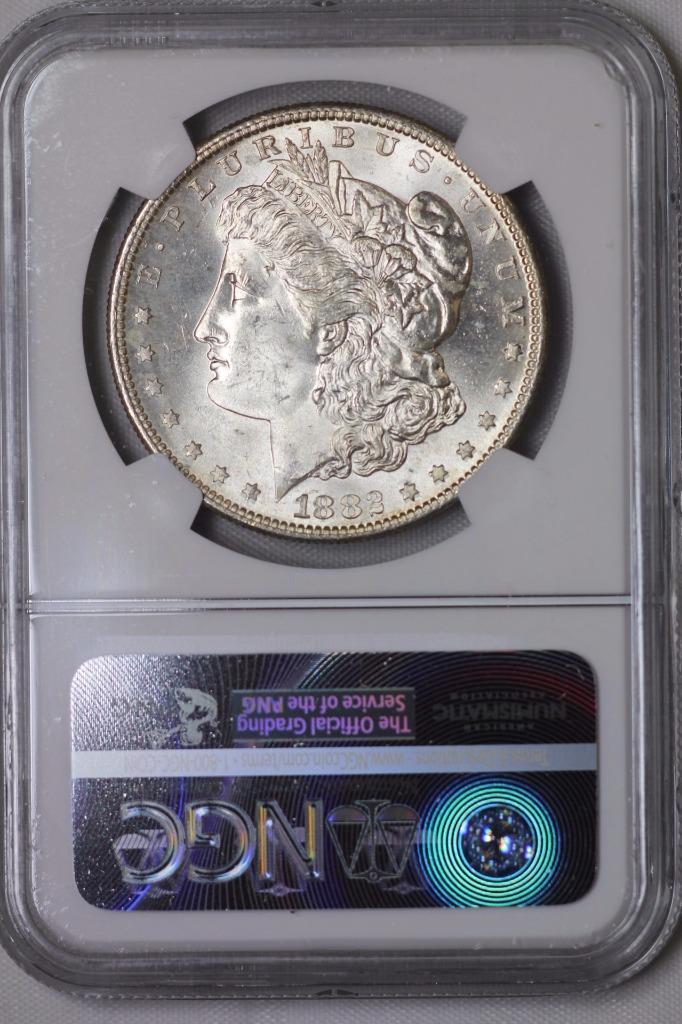 1882 S Morgan Silver Dollar MS65* NGC $1 Rainbow Toned United States Mint Coin