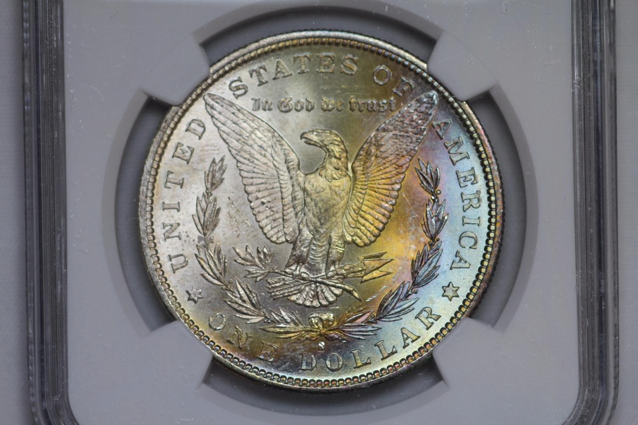 1882 S Morgan Silver Dollar MS65* NGC $1 Rainbow Toned United States Mint Coin