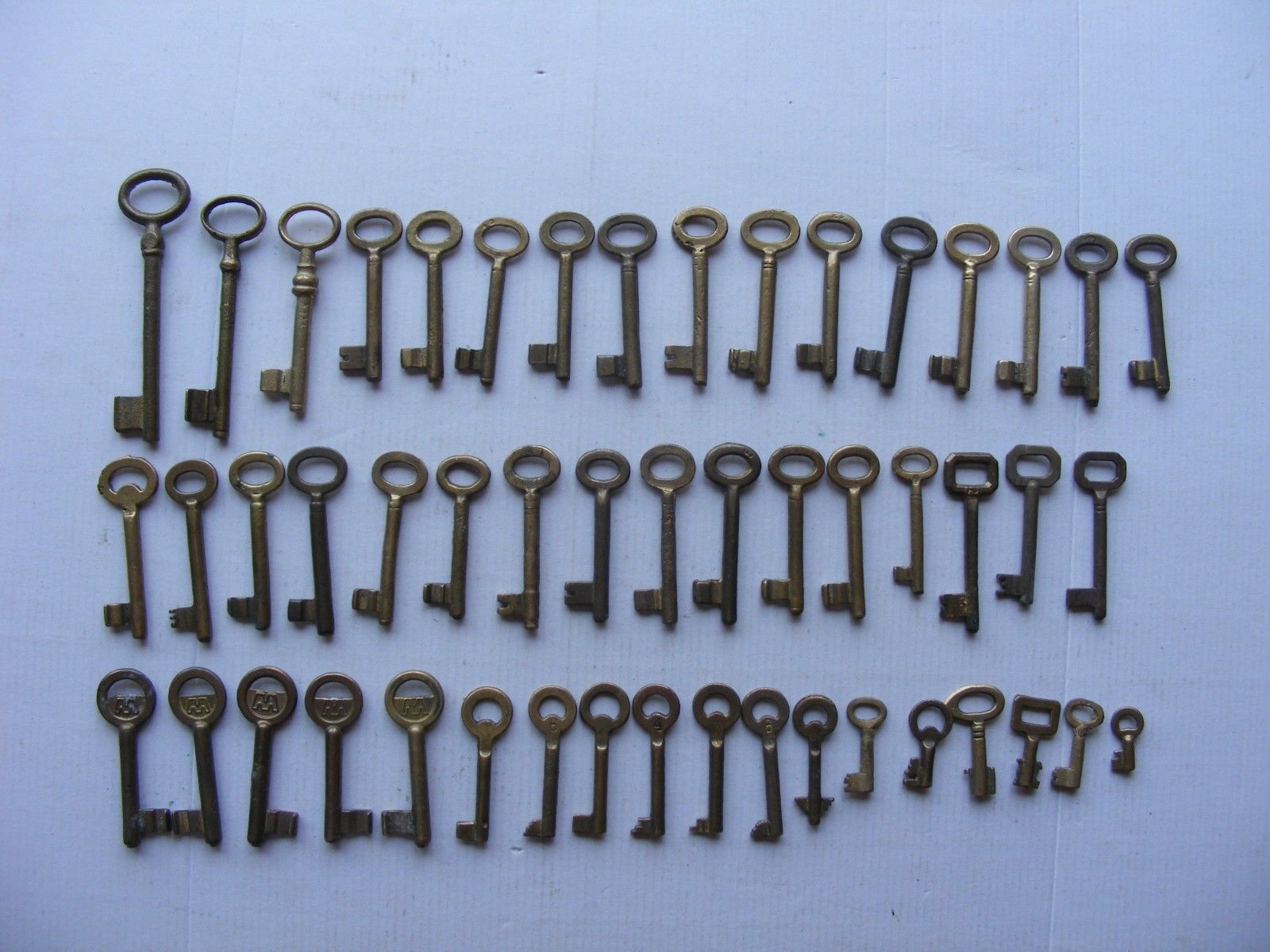 Lot of 50 old vintage antique skeleton keys all are Brass