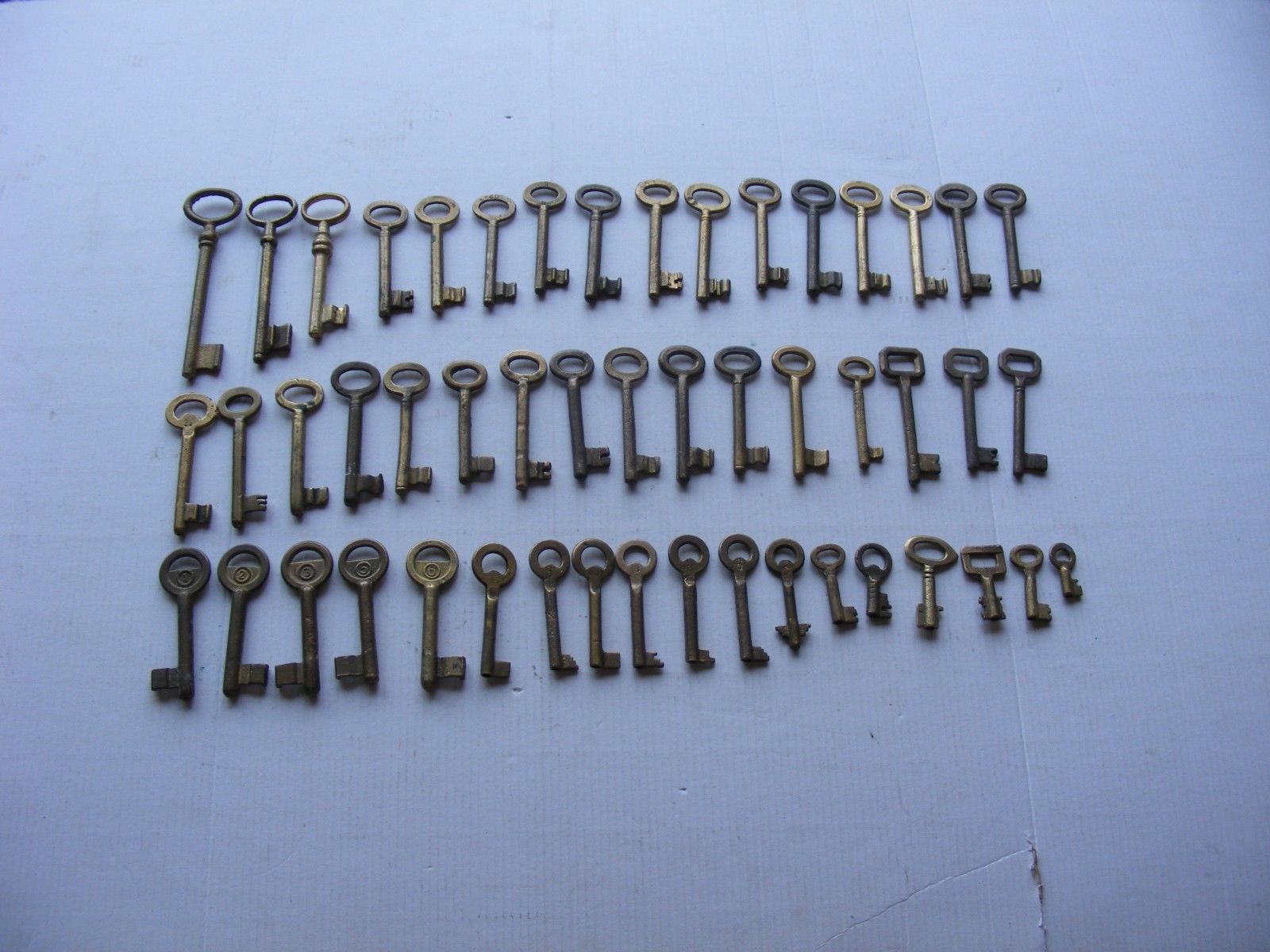 Lot of 50 old vintage antique skeleton keys all are Brass