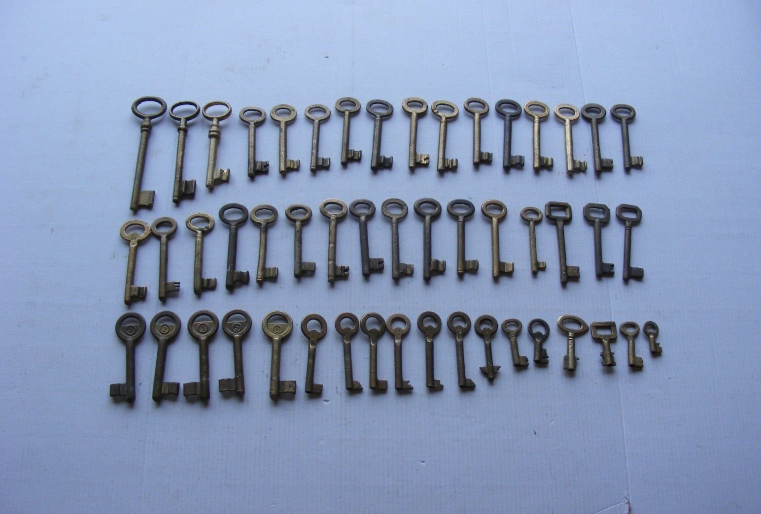 Lot of 50 old vintage antique skeleton keys all are Brass