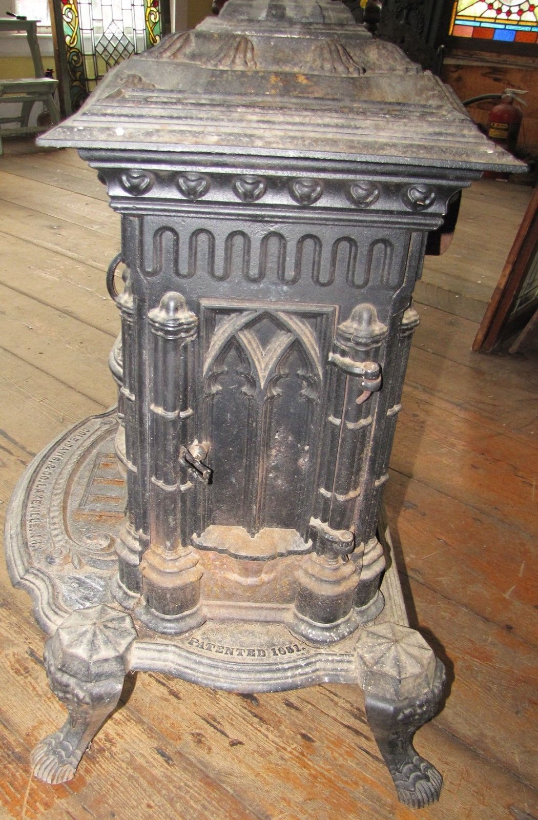 ANTIQUE CAST IRON GOTHIC PARLOR STOVE