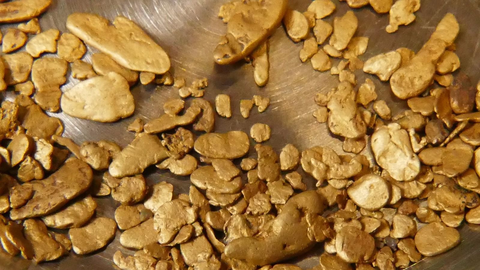 7.78  grams, a quarter troy ounce of natural British Columbia gold nuggets